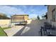 Backyard with trampoline, stone landscaping, a playhouse and A/C units at 12428 Lincoln Creek Ave, Las Vegas, NV 89138