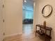 Hallway with a view to the living room, featuring modern decor at 12428 Lincoln Creek Ave, Las Vegas, NV 89138