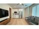 Bright living space combines kitchen and living room with modern appliances and decor at 12428 Lincoln Creek Ave, Las Vegas, NV 89138