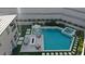Aerial view of backyard with swimming pool, spa, lounge chairs, and fire pit at 12428 Lincoln Creek Ave, Las Vegas, NV 89138