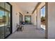 Covered back patio featuring outdoor seating area at 12720 Davis Wright Ct, Henderson, NV 89044