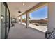 Spacious covered back patio with concrete floor and view of the backyard at 12720 Davis Wright Ct, Henderson, NV 89044