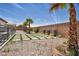 Stylish backyard with decorative stone and turf at 12720 Davis Wright Ct, Henderson, NV 89044