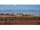 Backyard view with mountains in the distance at 12720 Davis Wright Ct, Henderson, NV 89044