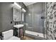 Unique bathroom featuring mosaic tile shower, modern fixtures, and a stylish vanity with interesting artistic accents at 12720 Davis Wright Ct, Henderson, NV 89044