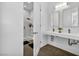 Contemporary bathroom with double sink, sleek fixtures, and a glass-enclosed shower for a spa-like experience at 12720 Davis Wright Ct, Henderson, NV 89044