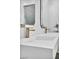 Sleek bathroom with double vanity, square sinks, modern fixtures, and minimalist design at 12720 Davis Wright Ct, Henderson, NV 89044