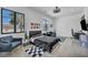 Spacious bedroom boasts natural light, modern decor, and room for relaxation with stylish furniture at 12720 Davis Wright Ct, Henderson, NV 89044