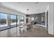 A dining room with large glass doors leading to an outdoor space at 12720 Davis Wright Ct, Henderson, NV 89044