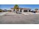Charming single-story home featuring a tile roof, desert landscaping, and a spacious driveway at 12720 Davis Wright Ct, Henderson, NV 89044
