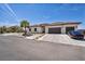 Charming single-story home featuring a tile roof, desert landscaping, and a spacious driveway at 12720 Davis Wright Ct, Henderson, NV 89044