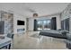 Luxurious main bedroom with balcony access, a statement wall, and modern decor at 12720 Davis Wright Ct, Henderson, NV 89044