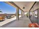 The covered patio offers a great outdoor space with a barbecue, wooden barrels, and city views at 12720 Davis Wright Ct, Henderson, NV 89044