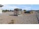 Expansive backyard with a large chicken coop and an above-ground pool; ample space for outdoor activities at 1581 Cavalry St, Pahrump, NV 89048