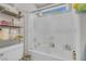 Shower and tub enclosure with glass door and organizers at 1581 Cavalry St, Pahrump, NV 89048