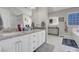 Bathroom featuring double sinks and a separate shower and tub at 1581 Cavalry St, Pahrump, NV 89048
