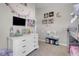 Colorful bedroom with tv, built-in bunkbeds and fun decor at 1581 Cavalry St, Pahrump, NV 89048