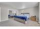 Comfortable bedroom featuring carpet, mirrored closet and light gray walls at 1581 Cavalry St, Pahrump, NV 89048