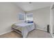 Cozy bedroom with two windows and neutral carpet at 1581 Cavalry St, Pahrump, NV 89048