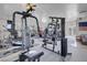 Bright garage featuring weightlifting machines, gym equipment, and fitness area with ample room to exercise at 1581 Cavalry St, Pahrump, NV 89048
