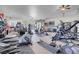 Large garage space with an array of workout equipment including treadmills, weights, and training machines at 1581 Cavalry St, Pahrump, NV 89048