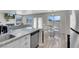 Open concept kitchen featuring granite counters, stainless appliances, and a bright breakfast nook at 1581 Cavalry St, Pahrump, NV 89048