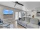 Bright open-concept living area with cozy seating, great view, and kitchen and dining area at 1581 Cavalry St, Pahrump, NV 89048