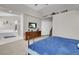 Open main bedroom with TV, large ensuite bathroom and walk in closet at 1581 Cavalry St, Pahrump, NV 89048