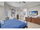 Spacious main bedroom suite featuring a TV, desk area, and en suite bathroom at 1581 Cavalry St, Pahrump, NV 89048