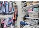 Spacious walk-in closet provides ample storage with shelving and hanging rods at 1581 Cavalry St, Pahrump, NV 89048