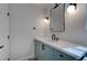 Modern bathroom with marble countertops and black accents at 1790 Castro Hill Ave, Henderson, NV 89012