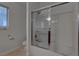 Bathroom with a shower-tub and glass door at 1790 Castro Hill Ave, Henderson, NV 89012