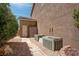 Exterior shot showing AC units, utilities, and partial view of the home's exterior and foliage at 1790 Castro Hill Ave, Henderson, NV 89012