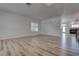 Open-concept living room with new flooring, fireplace, and lots of natural light at 1790 Castro Hill Ave, Henderson, NV 89012