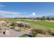 Expansive view of the lush green golf course, with mountain views in the background on a sunny day at 2024 Bay Tree Dr, Las Vegas, NV 89134