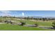Picturesque golf course view with lush greenery, sand traps, and distant mountain scenery at 2024 Bay Tree Dr, Las Vegas, NV 89134