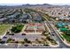 Aerial view of neighborhood park with basketball courts and playgrounds at 2116 Via Firenze, Henderson, NV 89044