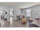 Bonus room features a desk, couch, and lots of natural light making it ideal for an office at 2116 Via Firenze, Henderson, NV 89044