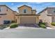 Charming two-story home featuring a two-car garage and well-maintained landscaping at 2116 Via Firenze, Henderson, NV 89044