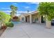 Inviting backyard featuring a pool, patio, and lush landscaping, perfect for relaxation at 2132 Twin Falls Dr, Henderson, NV 89044