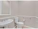 Traditional half bath with a pedestal sink, toilet, and decorative trim at 2132 Twin Falls Dr, Henderson, NV 89044
