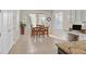 Inviting dining area features bright windows, modern lighting and custom millwork at 2132 Twin Falls Dr, Henderson, NV 89044