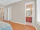 Hallway leading to bath with dual sink vanity and walk-in shower at 2132 Twin Falls Dr, Henderson, NV 89044