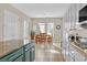 Well-lit kitchen with ample cabinet space and modern appliances at 2132 Twin Falls Dr, Henderson, NV 89044
