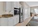 Spacious kitchen features stainless steel appliances and ample cabinet storage at 2132 Twin Falls Dr, Henderson, NV 89044