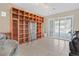 Bright living space with custom built-ins and direct access to the backyard at 2132 Twin Falls Dr, Henderson, NV 89044