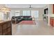 Comfortable living room features a large leather sofa, and tiled floors at 2132 Twin Falls Dr, Henderson, NV 89044