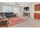 Comfortable living room with ceiling fan, window and stylish décor at 2132 Twin Falls Dr, Henderson, NV 89044