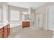 Bright main bathroom with double vanity, soaking tub, and separate glass shower at 2132 Twin Falls Dr, Henderson, NV 89044