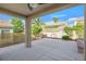 Spacious covered patio with ample room for outdoor seating and entertaining overlooking the backyard at 2132 Twin Falls Dr, Henderson, NV 89044